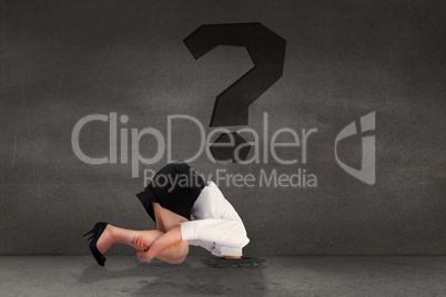 Composite image of businesswoman burying her head