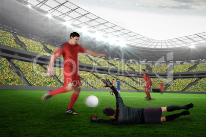 Composite image of football match in progress