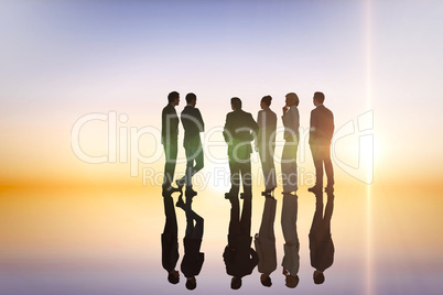 Composite image of business colleagues standing