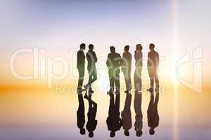 Composite image of business colleagues standing