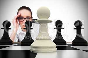 Composite image of thinking businesswoman