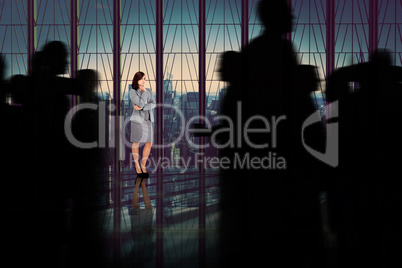 Composite image of silhouette of business people walking