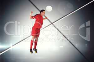 Composite image of football player in red jumping