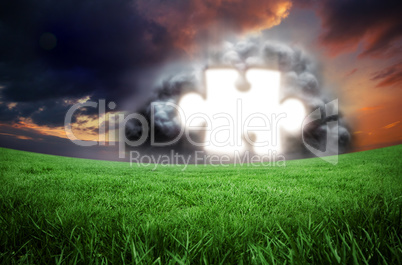Composite image of jigsaw in cloud