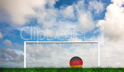 Composite image of football in germany colours