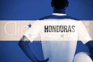 Composite image of honduras football player holding ball