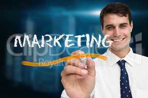 Businessman writing the word marketing