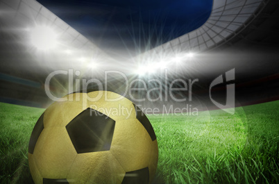 Composite image of gold football