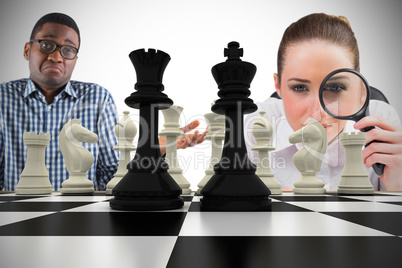 Composite image of business people with chessboard