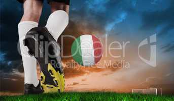 Composite image of football boot kicking italy ball
