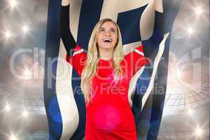 Composite image of cheering football fan in red holding greece f