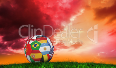 Composite image of football in multi national colours