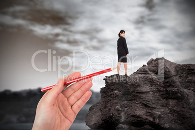 Composite image of hand drawing businesswoman