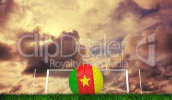Composite image of football in cameroon colours