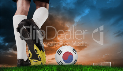 Composite image of football boot kicking korea republic ball