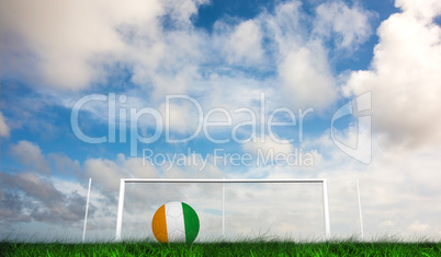 Composite image of football in ivory coast colours