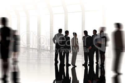 Composite image of business colleagues standing