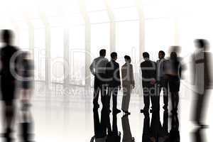 Composite image of business colleagues standing