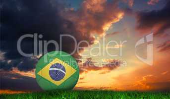 Composite image of football in brasil colours