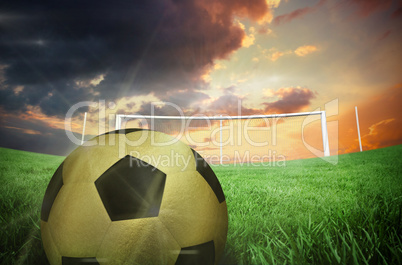 Composite image of gold football