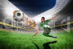 Composite image of football player in green kicking