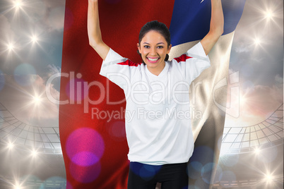 Composite image of football fan in white cheering holding chile