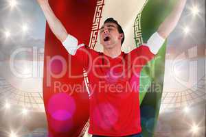 Composite image of excited football fan cheering holding iran fl