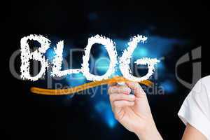 Businesswoman writing the word blog