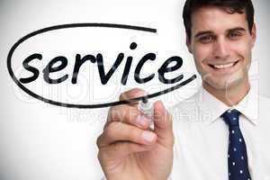 Businessman writing the word service