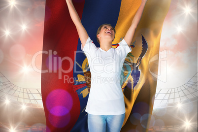 Composite image of pretty football fan in white cheering holding Composite image of pretty football fan in white cheering holding