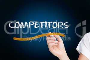 Businesswoman writing the word competitors