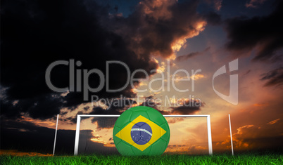 Composite image of football in brasil colours