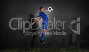 Composite image of football player in blue jumping