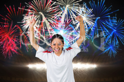 Composite image of football fan in white cheering