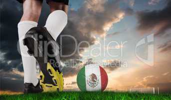Composite image of football boot kicking mexico ball