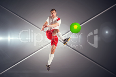 Composite image of football player in white kicking