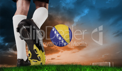 Composite image of football boot kicking bosnia ball