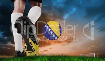 Composite image of football boot kicking bosnia ball