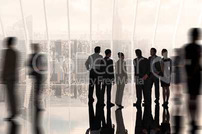 Composite image of business colleagues standing