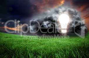 Composite image of light bulb in cloud
