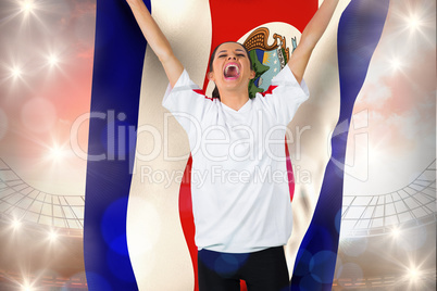 Composite image of football fan in white cheering holding costa