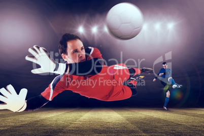 Composite image of fit goal keeper jumping up