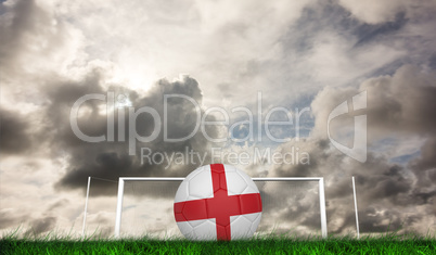 Composite image of football in england colours