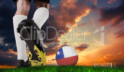 Composite image of football boot kicking chile ball