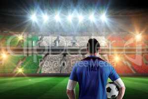 Composite image of italy football player holding ball