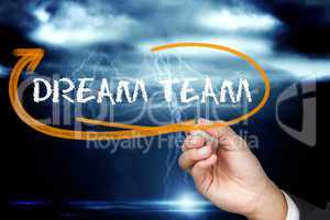 Businessman writing the word dream team