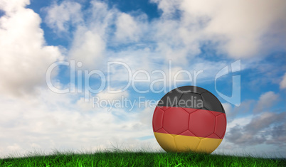 Composite image of football in germany colours