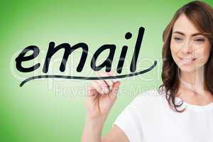 Businesswoman writing the word email