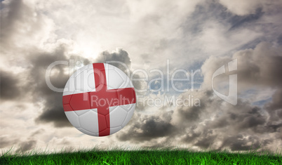 Composite image of football in england colours