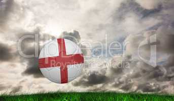 Composite image of football in england colours